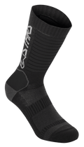 Alpinestars Paragon Lite Socks 19, meias de mountain bike, pretas, construção em malha técnica, logótipo Alpinestars vertical, textura canelada para elasticidade, calcanhar e biqueira reforçados, tecido leve e respirável para ciclismo todo-o-terreno