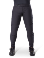Alpinestars A-Dura Thermal Pant, Black mountain bike pants, featuring a secure ratchet closure and pre-curved fit, worn with black cycling shoes, durable technical material for cold-weather trail riding