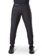 Alpinestars A-Dura Waterproof Pants, Black, mountain bike trousers featuring a ratchet waist closure and zippered pockets, front view on model paired with black shoes, durable waterproof gear for MTB