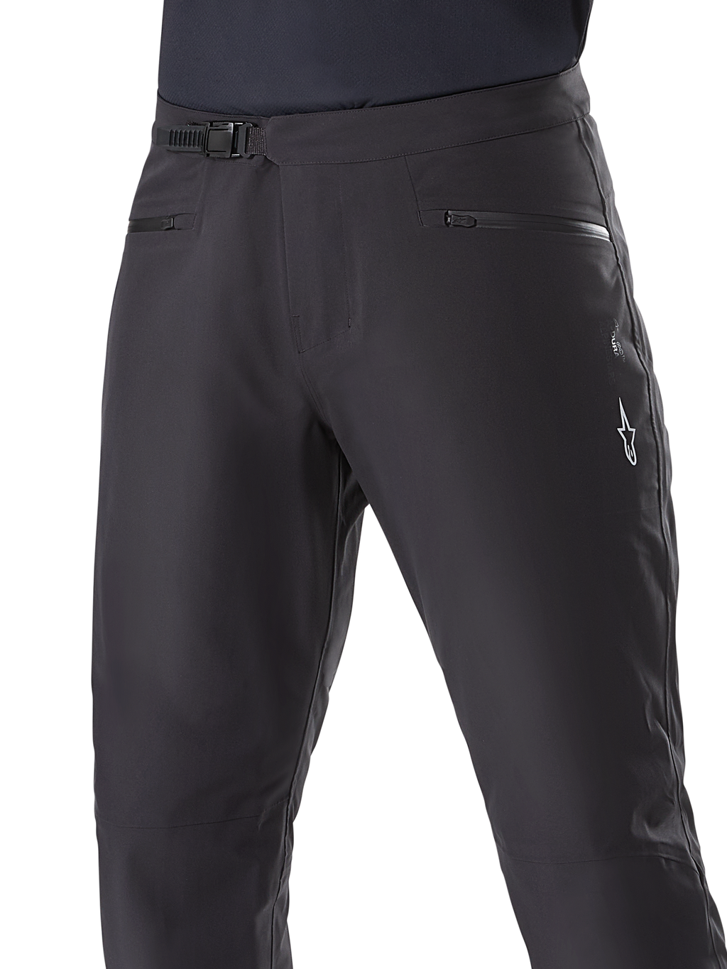 Alpinestars A-Dura Waterproof Pants, Mountain Bike Pants, Black, close-up of waist showing ratchet closure system and zippered pockets, featuring a white Alpinestars logo on the thigh, durable textile for wet-weather trail riding