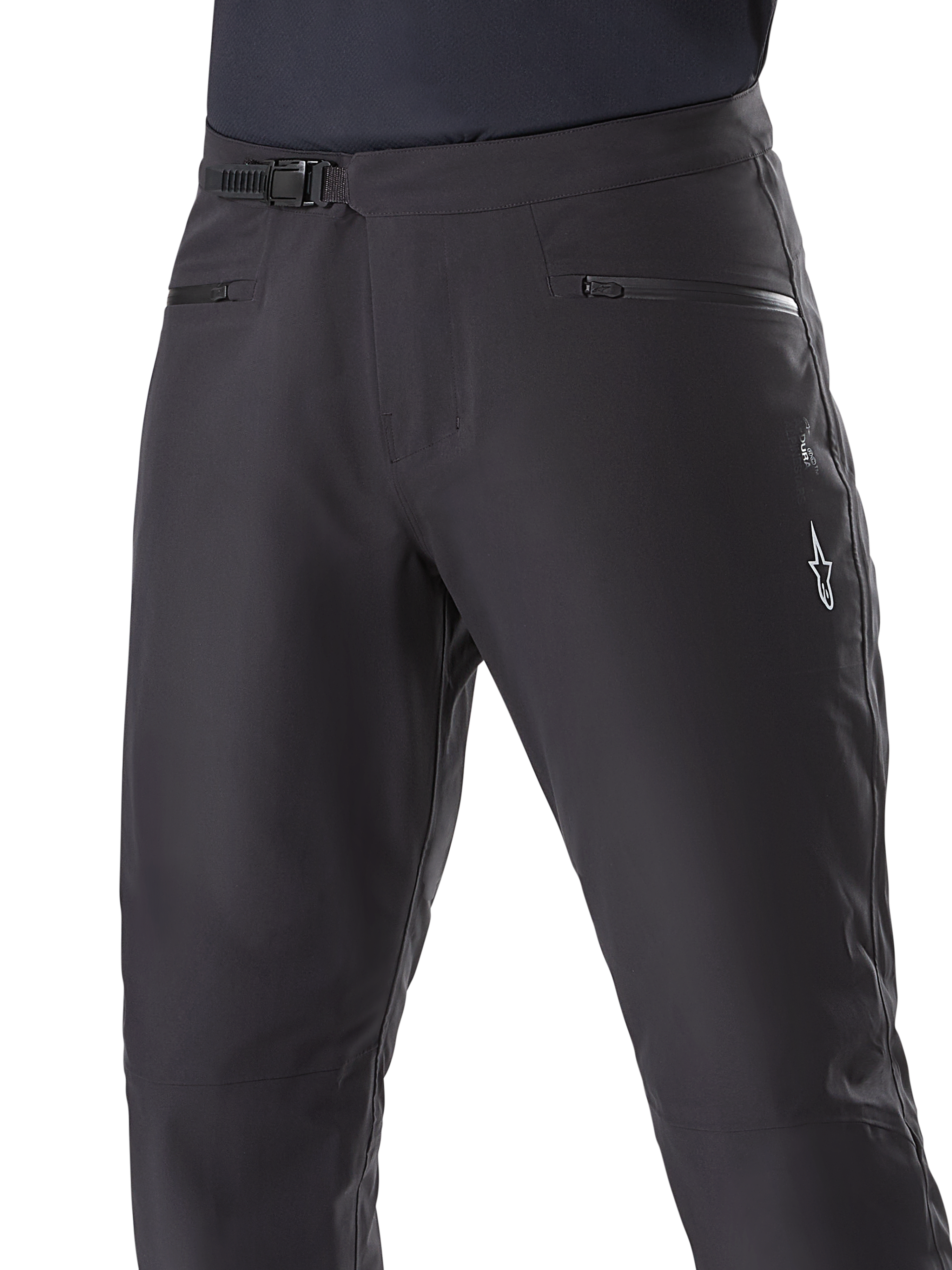 Alpinestars A-Dura Waterproof Pants, Mountain Bike Pants, Black, close-up of waist showing ratchet closure system and zippered pockets, featuring a white Alpinestars logo on the thigh, durable textile for wet-weather trail riding