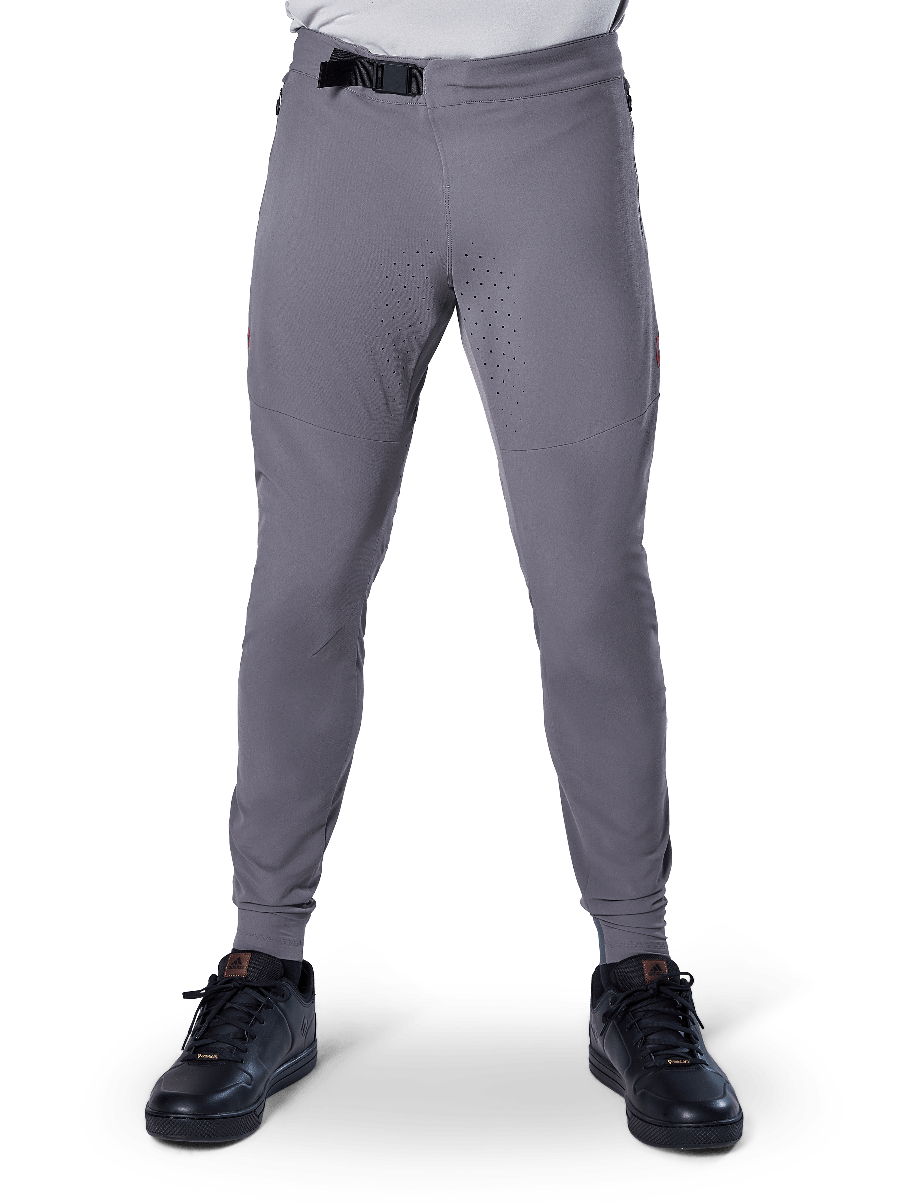 Alpinestars A-Aria Elite Pants, Mountain Bike Pants, Dark Gray, featuring laser perforations on inner thighs for ventilation and a magnetic buckle closure at the waist, performance fit with tapered legs worn with black athletic shoes