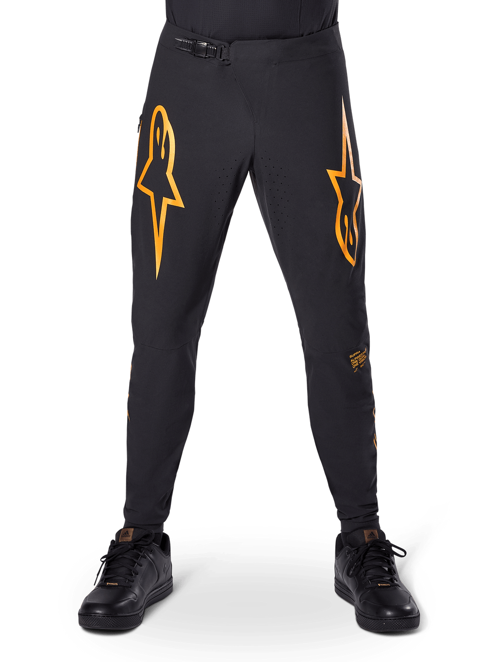 Alpinestars A-Supra Race Pants, MTB Cycling Pants, Black with bold orange logos, featuring a ratchet waist closure and laser-perforated ventilation, performance fit designed for off-road mountain bike racing