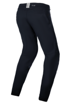 Alpinestars Stella A-Dura Thermal Pants, calças de BTT para mulher, pretas, equipamento técnico de exterior para clima frio, vista traseira de três quartos realçando o ajuste ergonómico pré-curvado e a cintura traseira com a marca ASTARS.