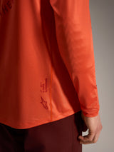 Camisola Alpinestars A-Dura Air laranja, manga comprida em malha respirável com detalhe do logótipo nas costas.