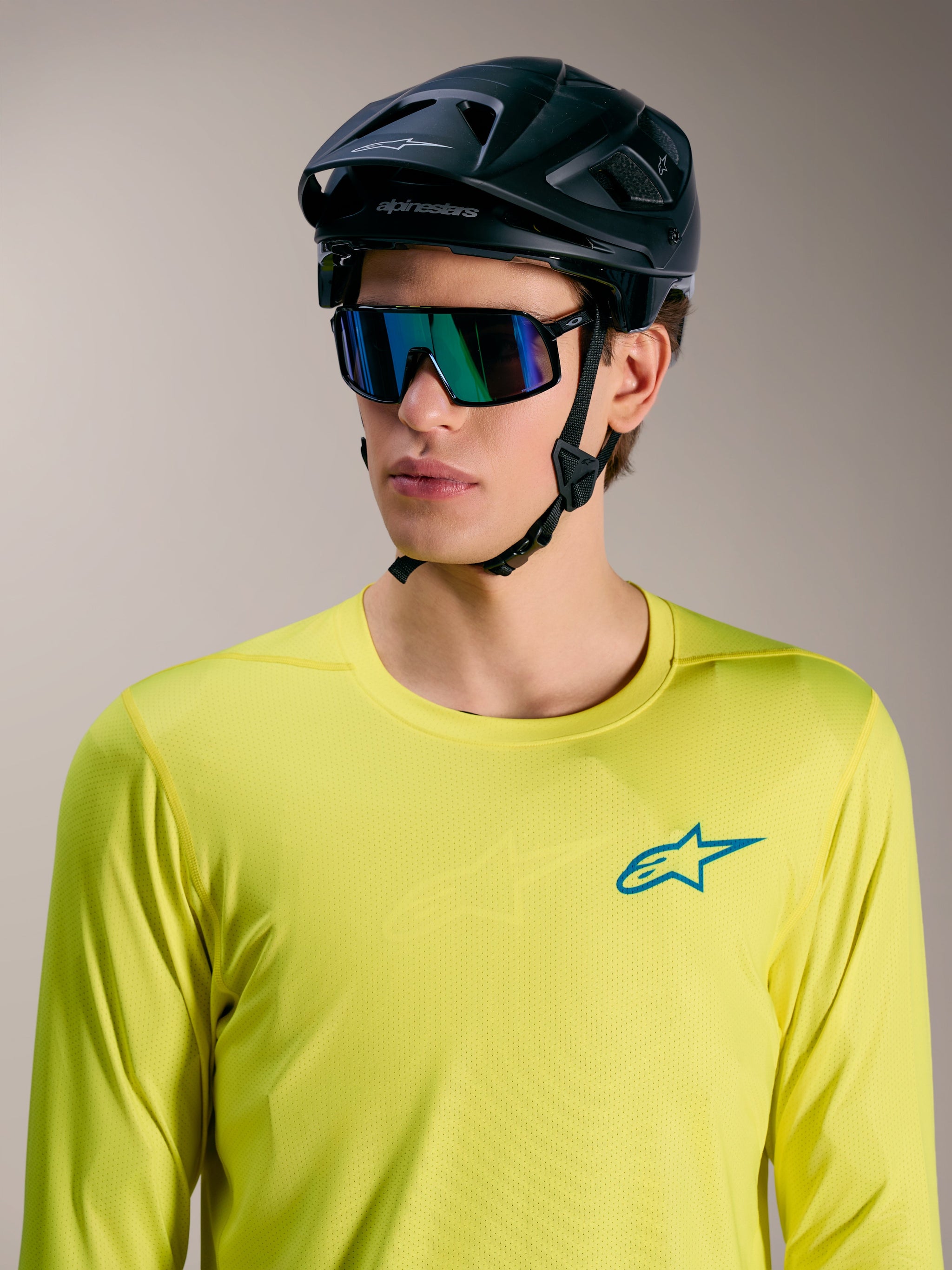 Yellow Fluo A-Dura Air Long Sleeve Jersey, breathable MTB jersey worn with black mountain bike helmet and sunglasses.
