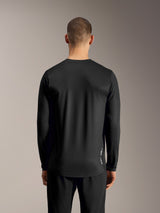 Black A-Dura Ride Long Sleeve Jersey, performance mountain bike top featuring a breathable jacquard knit, rear view.