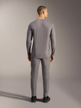 Camisola Alpinestars A-Dura Ride cinzenta, topo de BTT em tecido jacquard elástico com mangas compridas e cauda mais longa.