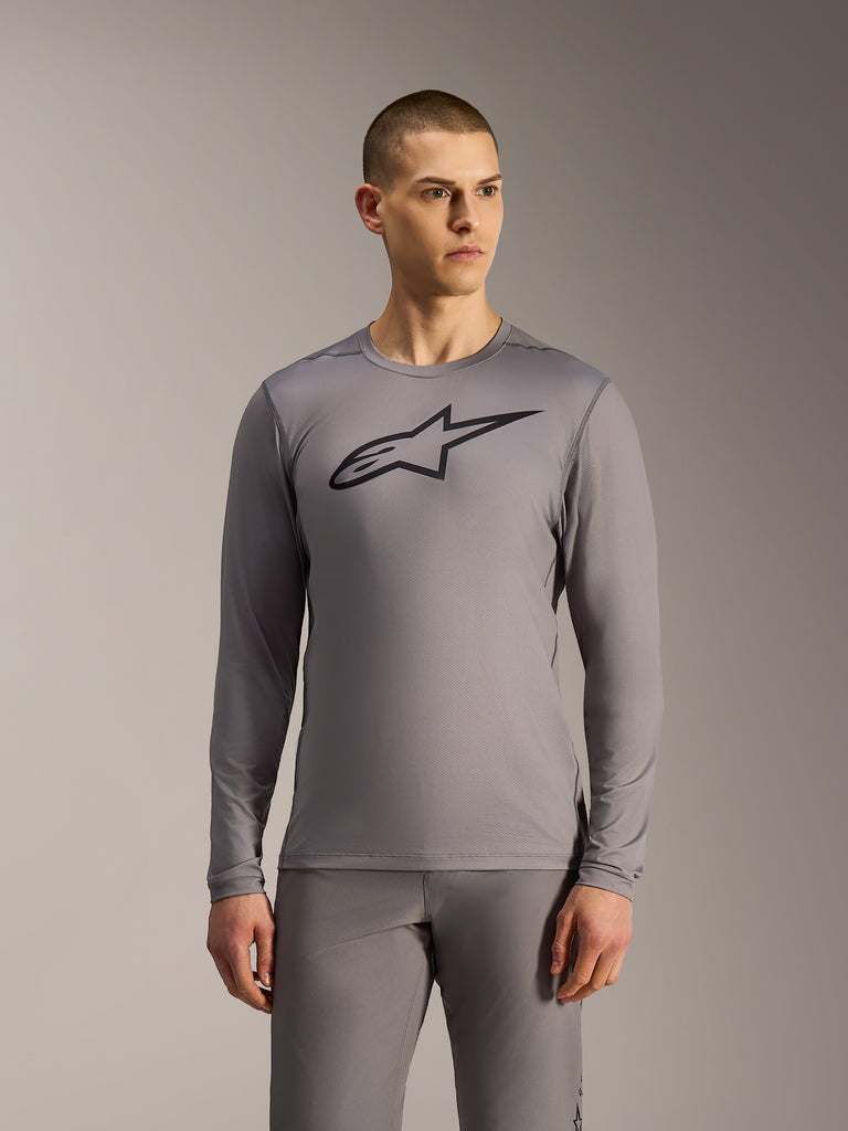 Alpinestars A-Dura Ride Long Sleeve MTB Jersey in Gray, featuring a black chest logo and performance mesh construction