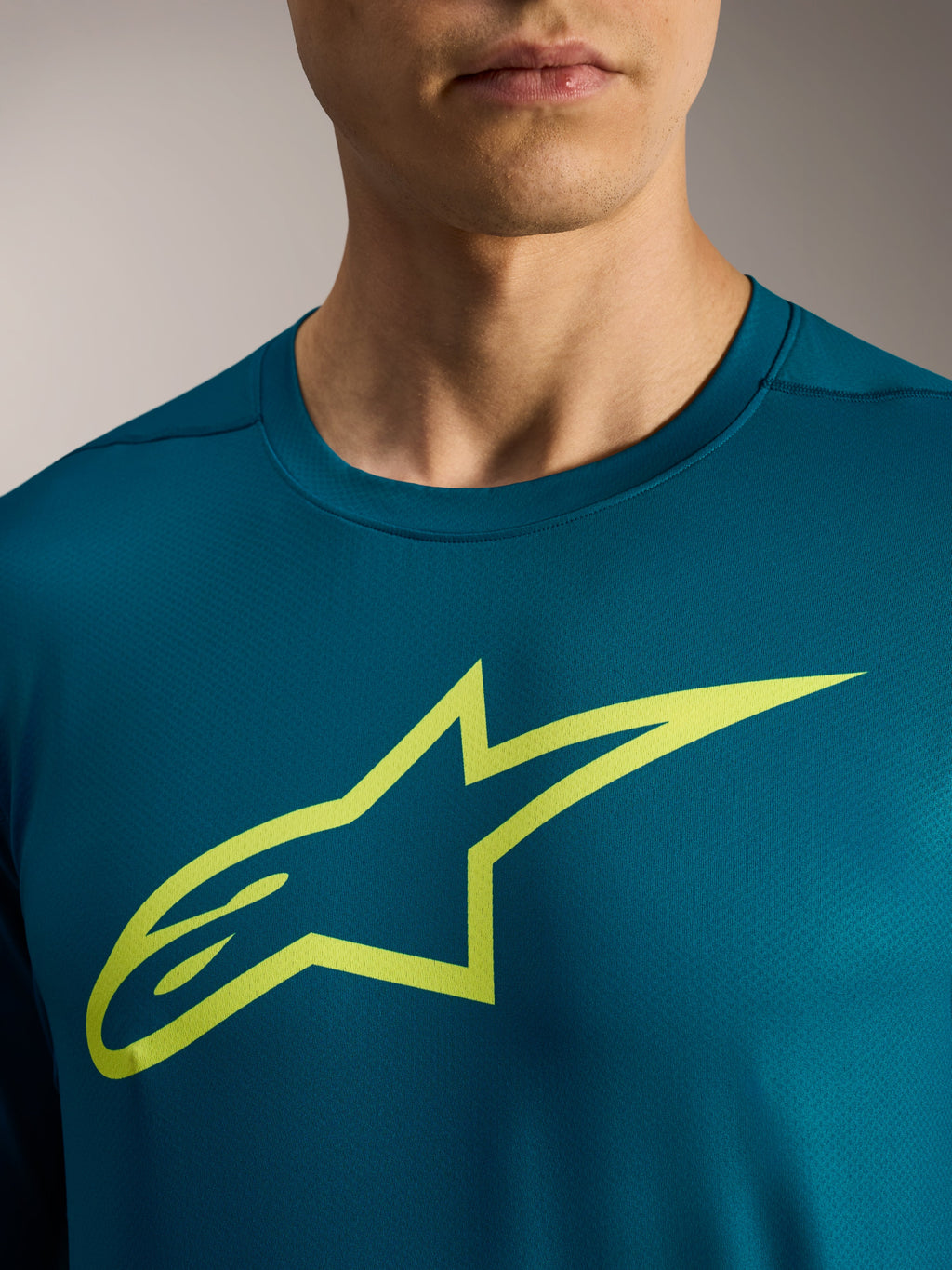 Jersey A-Dura Ride em azul esverdeado com logótipo Astars lima no peito, vestuário de performance para BTT.