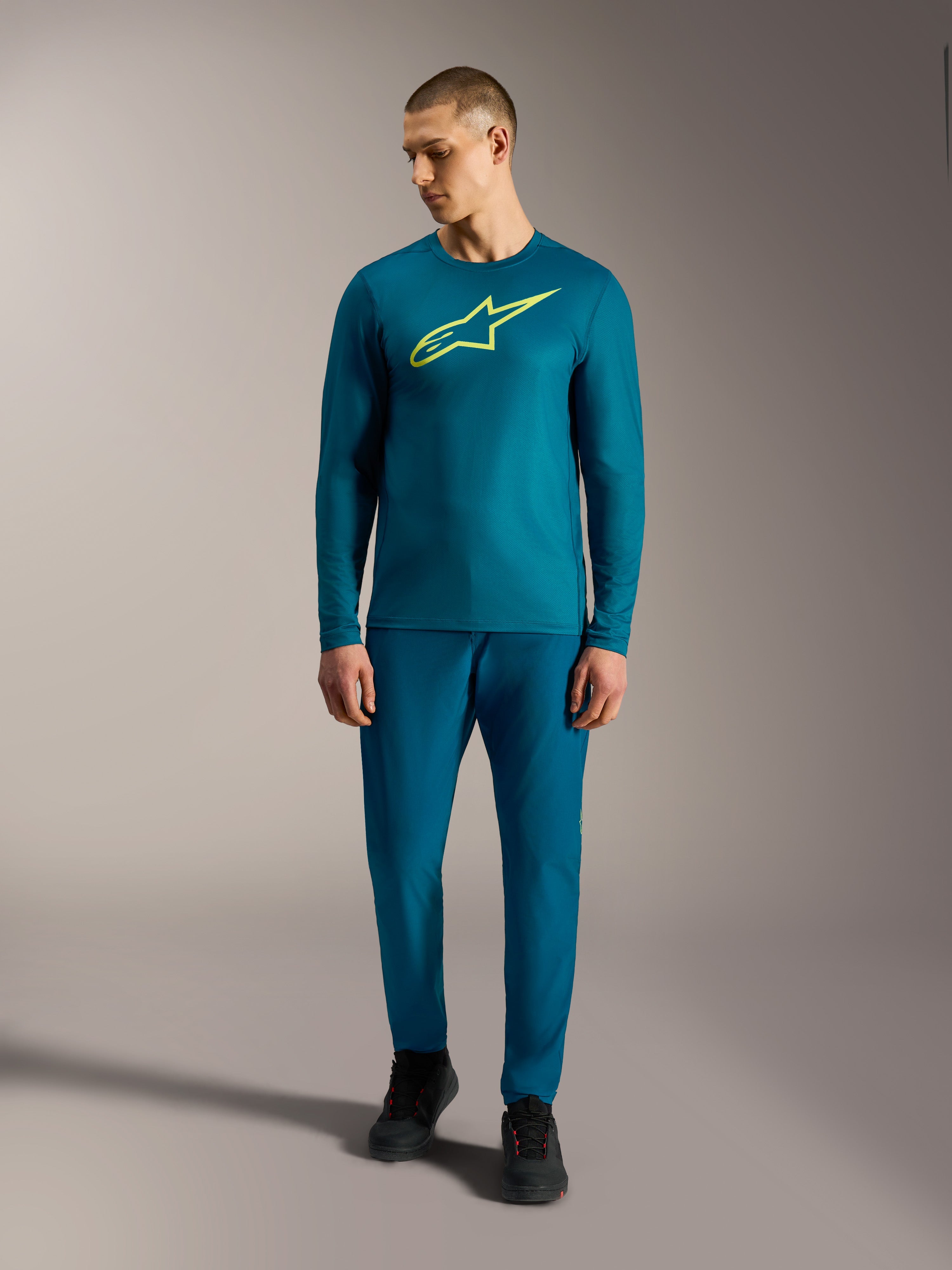 Jersey Alpinestars A-Dura Ride verde azulado com logótipo amarelo lima, vestuário técnico de BTT para homem.
