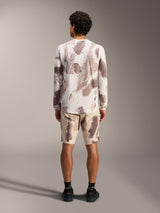 A-Dura Ride Long Sleeve Jersey in Sand Camo, back view showing the recycled polyester blend and matching MTB shorts.