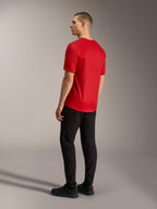 A-Dura Ride Short Sleeve Jersey in red, rear view showing drop tail design and stretch fabric construction for MTB performance.