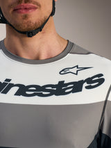 Camisola A-Dura Race de mangas compridas, cinzenta com painel branco e logótipos Alpinestars pretos para BTT.