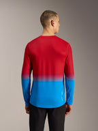 Camisola MTB Alpinestars A-Dura ASTARS 2.0, manga comprida, gradiente vermelho e azul, vista traseira e cauda longa.