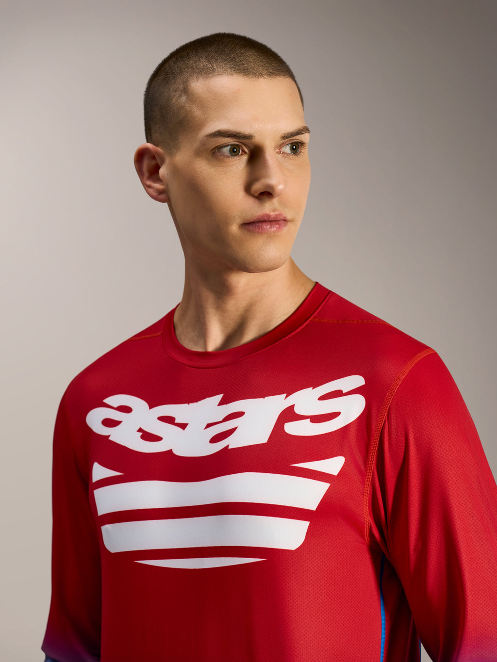 Camisola MTB A-Dura ASTARS 2.0 de manga comprida, em vermelho vivo e azul com gráficos brancos no peito.