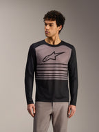 Camisola Alpinestars A-Dura Elite 2.0 de manga comprida para BTT, em blocos preto e cinzento com logótipo no peito.