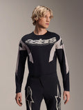 Alpinestars A-Supra Melt Jersey de manga comprida, camisola de MTB, preta e cinzenta, com o grafismo 'astars' no peito e mangas com padrões, usada com calças de performance a condizer
