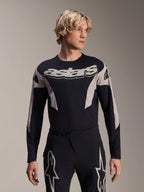 Alpinestars A-Supra Melt Jersey de manga comprida, camisola de MTB, preta e cinzenta, com o grafismo 'astars' no peito e mangas com padrões, usada com calças de performance a condizer
