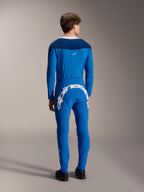 Calças Alpinestars A-Supra Melt e camisola de manga comprida a condizer, azul, vista traseira com destaque para o grande logótipo Alpinestars em branco na pala traseira, equipamento de BTT de performance com um ajuste atlético flexível