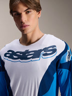 Alpinestars A-Supra Melt Jersey, camisola de BTT de manga comprida, azul e branca com gráficos em azul-marinho, com um logótipo 'astars' grande no peito, material de desempenho microperfurado, ajuste atlético para BTT