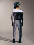 Camisola Alpinestars A-Supra Elite cinzenta, vista traseira de BTT de alta performance com painéis ventilados.
