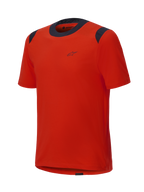 Alpinestars A-Dura Dri Wool Short Sleeve Jersey, camisola de manga curta Spicy Orange com painéis de malha pretos na gola e nos ombros, design minimalista com um pequeno logótipo no peito, vestuário técnico de BTT
