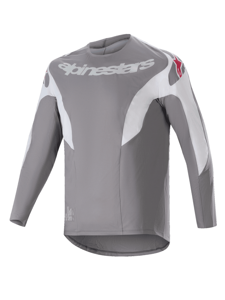 Alpinestars A-Supra Race Jersey, Long Sleeve MTB Jersey, Dark Gray with white paneling, featuring white Alpinestars logo on the chest and red star logos on shoulders, technical micro-perforated fabric with a dropped tail design for off-road cycling
