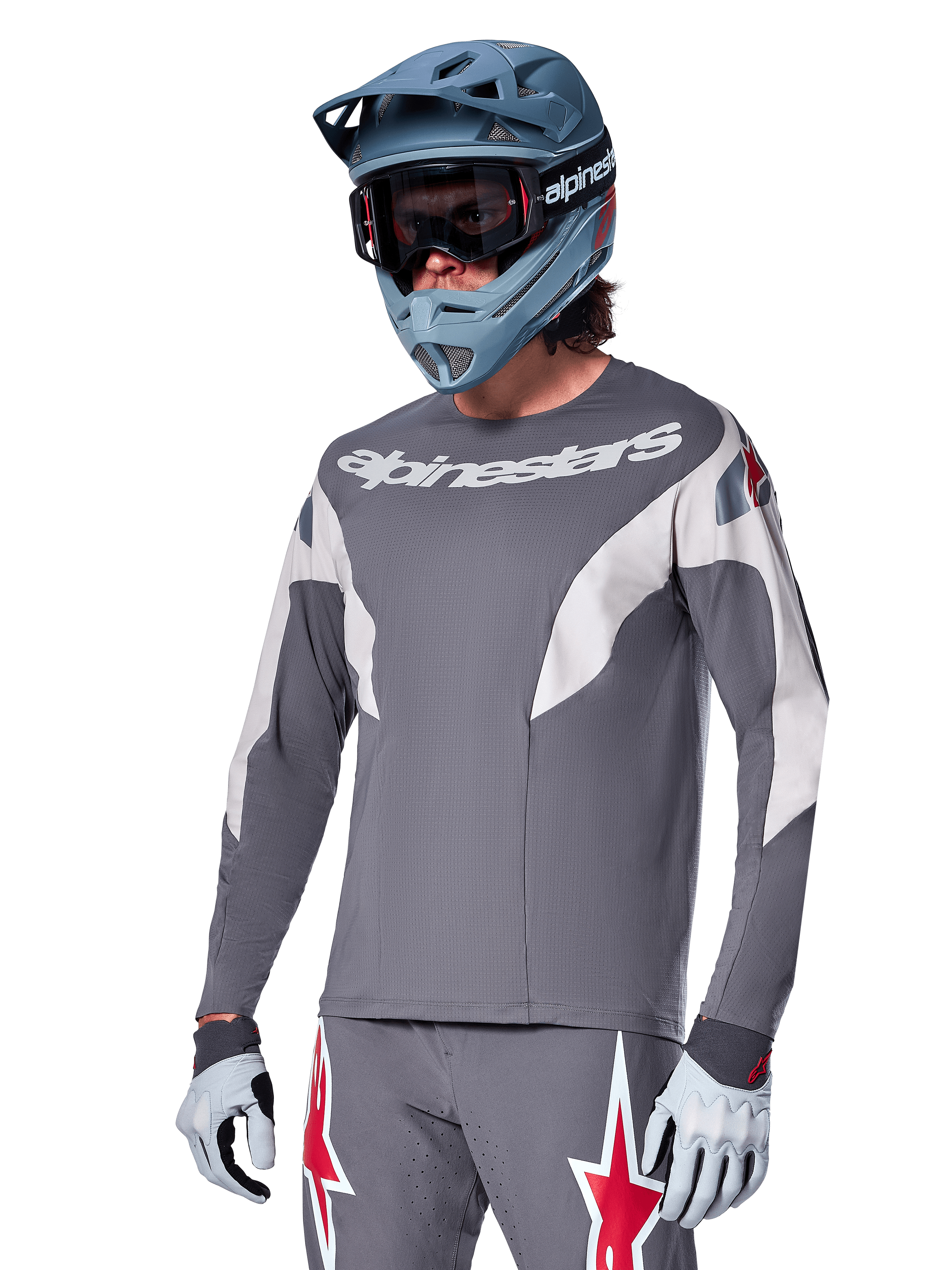 Alpinestars A-Supra Race Jersey - Long Sleeve, Dark Gray with white and red accents, racing-style graphics, worn with matching gray pants, blue full-face helmet, and white gloves, professional MTB and downhill racing gear