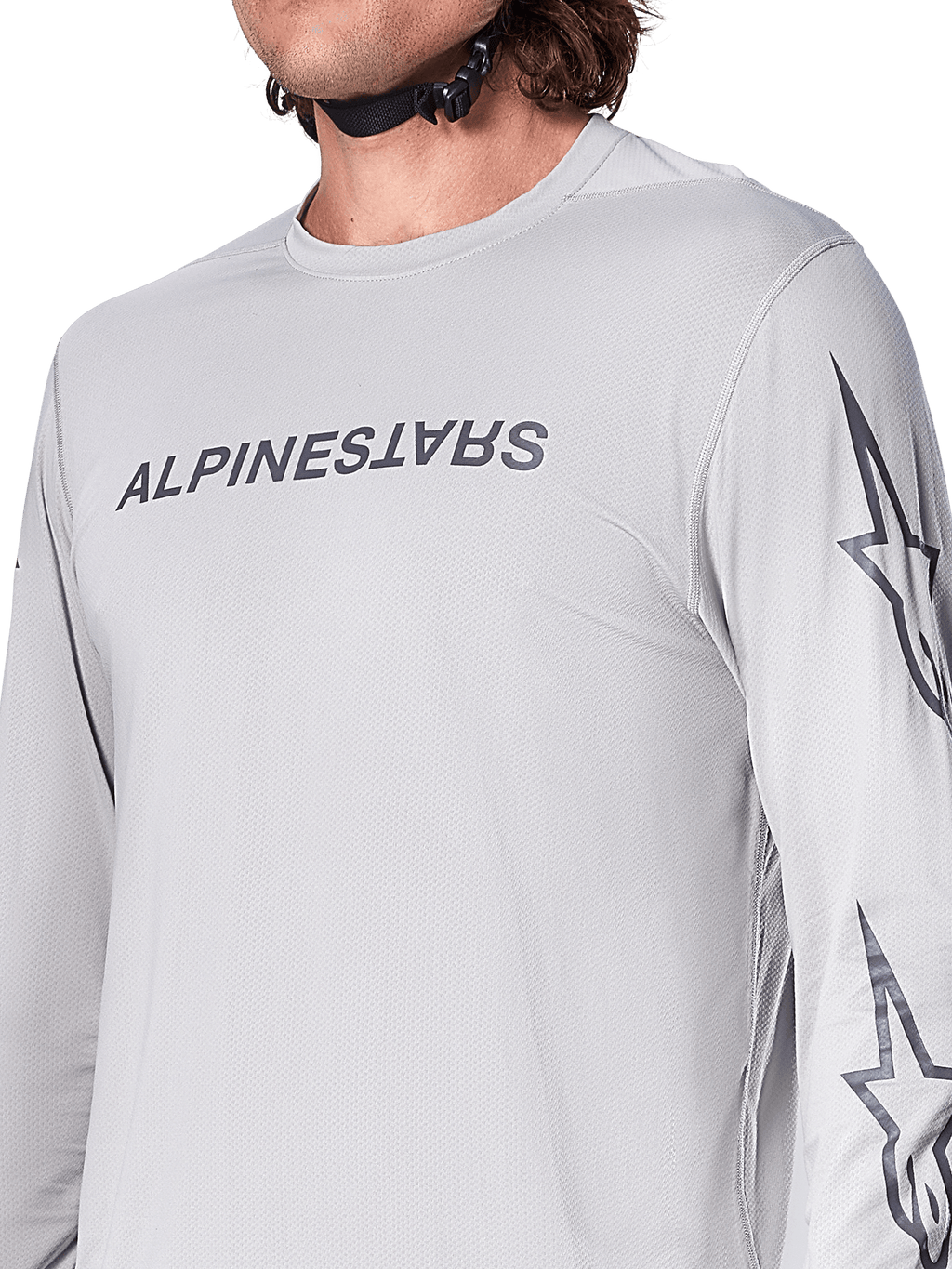 Alpinestars A-Dura Switch Jersey - Manga Comprida, camisola de BTT em cinzento claro com logótipo escrito em cinzento escuro no peito e logótipo de estrela na manga, textura jacquard respirável, equipamento de ciclismo de performance para trilhos