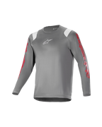 Alpinestars Youth A Supra Astar Jersey, camisola de manga comprida para jovens, cinzenta escura com detalhes brancos nos ombros e marca vermelha nas mangas, logótipo branco no peito, tecido técnico respirável, gola redonda, corte atlético de alta performance para mountain biking