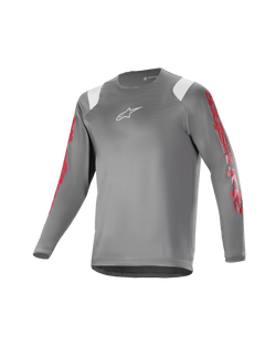 Alpinestars Youth A Supra Astar Jersey, camisola de manga comprida para jovens, cinzenta escura com detalhes brancos nos ombros e marca vermelha nas mangas, logótipo branco no peito, tecido técnico respirável, gola redonda, corte atlético de alta performance para mountain biking