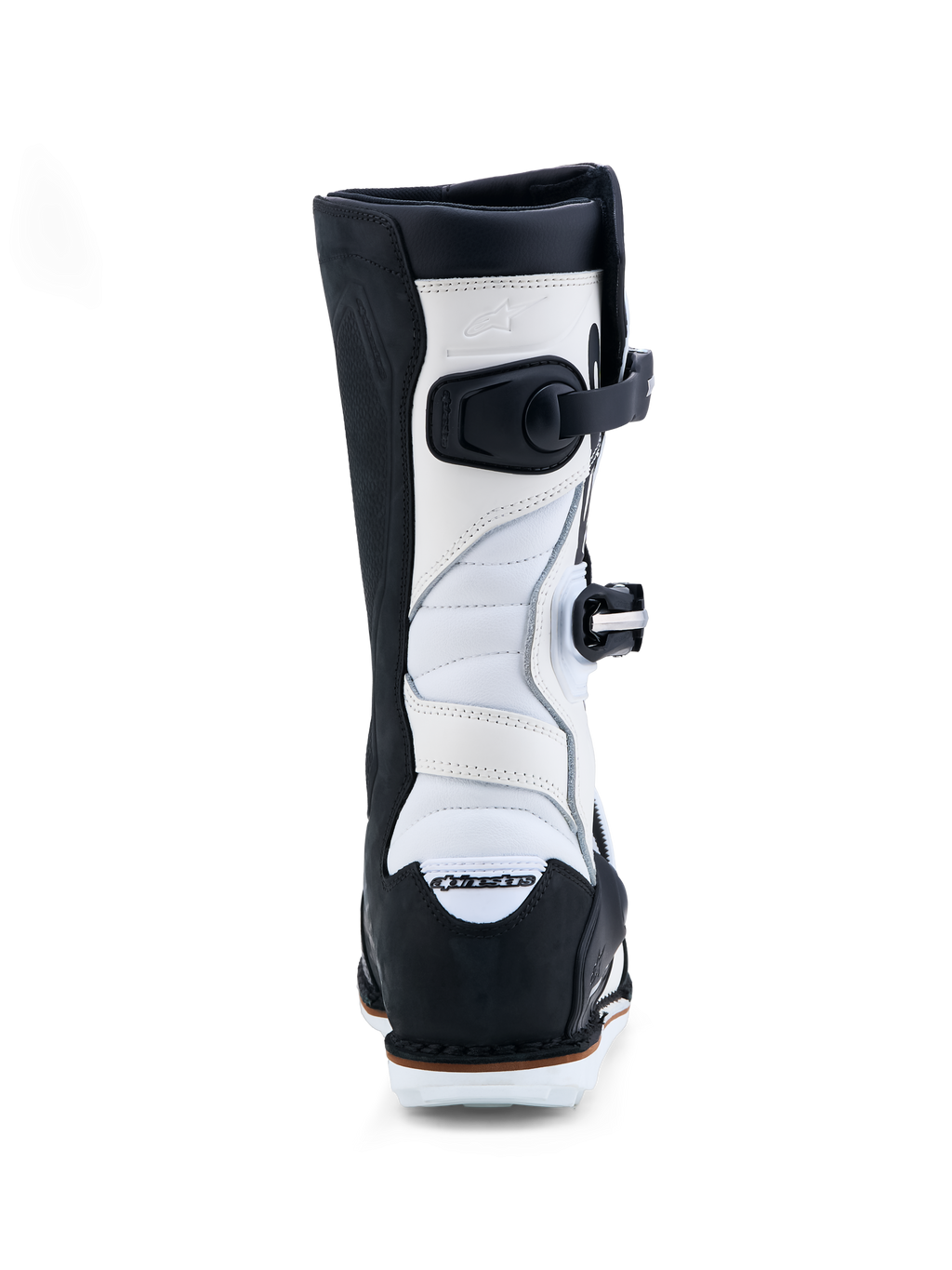 Alpinestars Tech-T, botas de moto para trial, pretas e brancas, couro com zonas de acordeão, vista traseira.