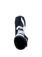 Alpinestars Botas Tech-T, botas de moto para trials, pretas e brancas, vista superior mostrando construção em couro e fecho de fivelas para precisão off-road.