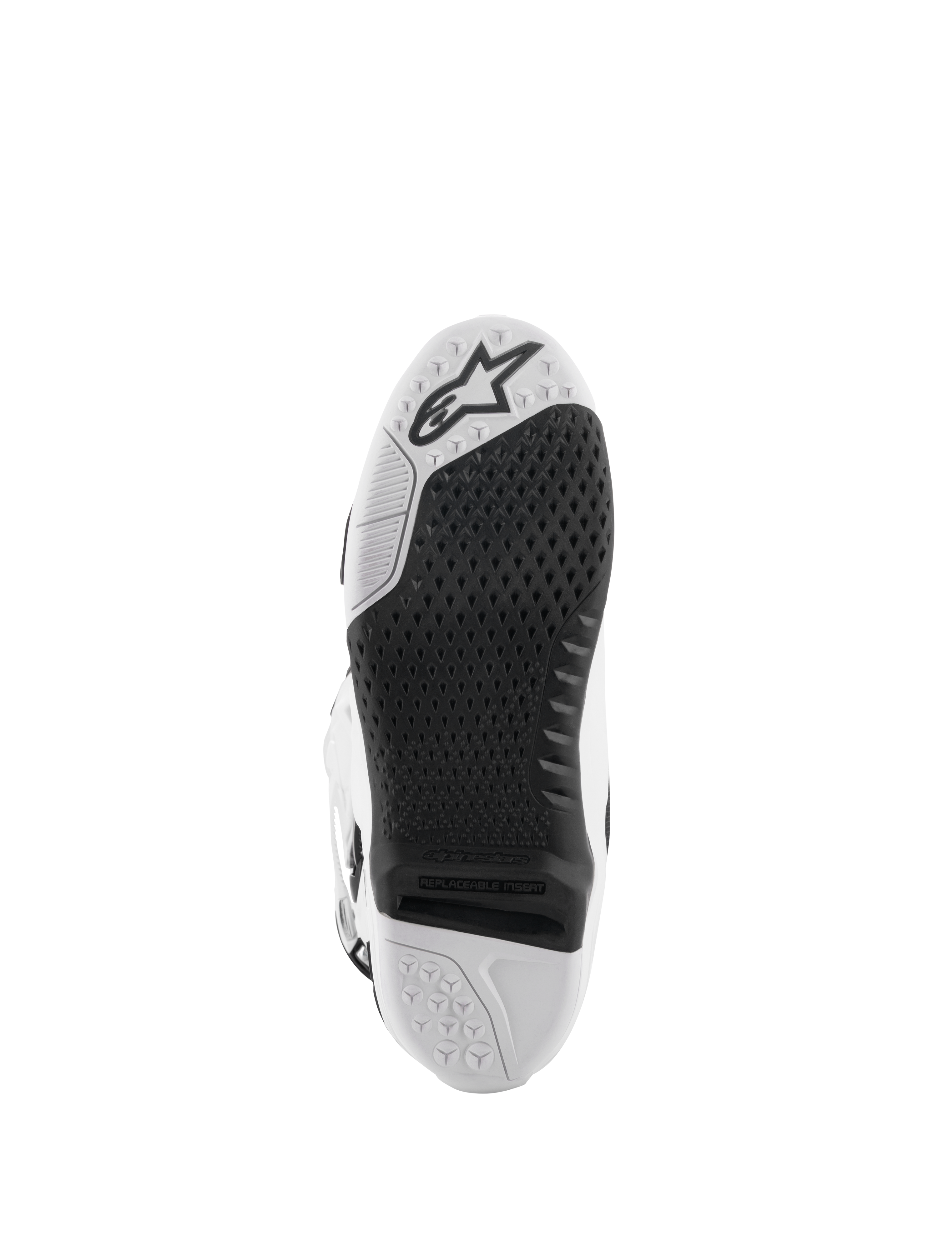 Alpinestars Tech 10 Boots, Motocross Boots, White and Black, bottom view of the sole featuring a textured grip pattern, Alpinestars logo, and a replaceable central insert for off-road racing.