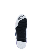 Botas Alpinestars Tech 10, vista da sola, Branco, Violeta, Azul Marinho e Rosa Fluo, rasto de borracha preta de alta aderência com inserção central substituível, biqueira e calcanhar brancos com logótipo de estrela, calçado profissional de motocross