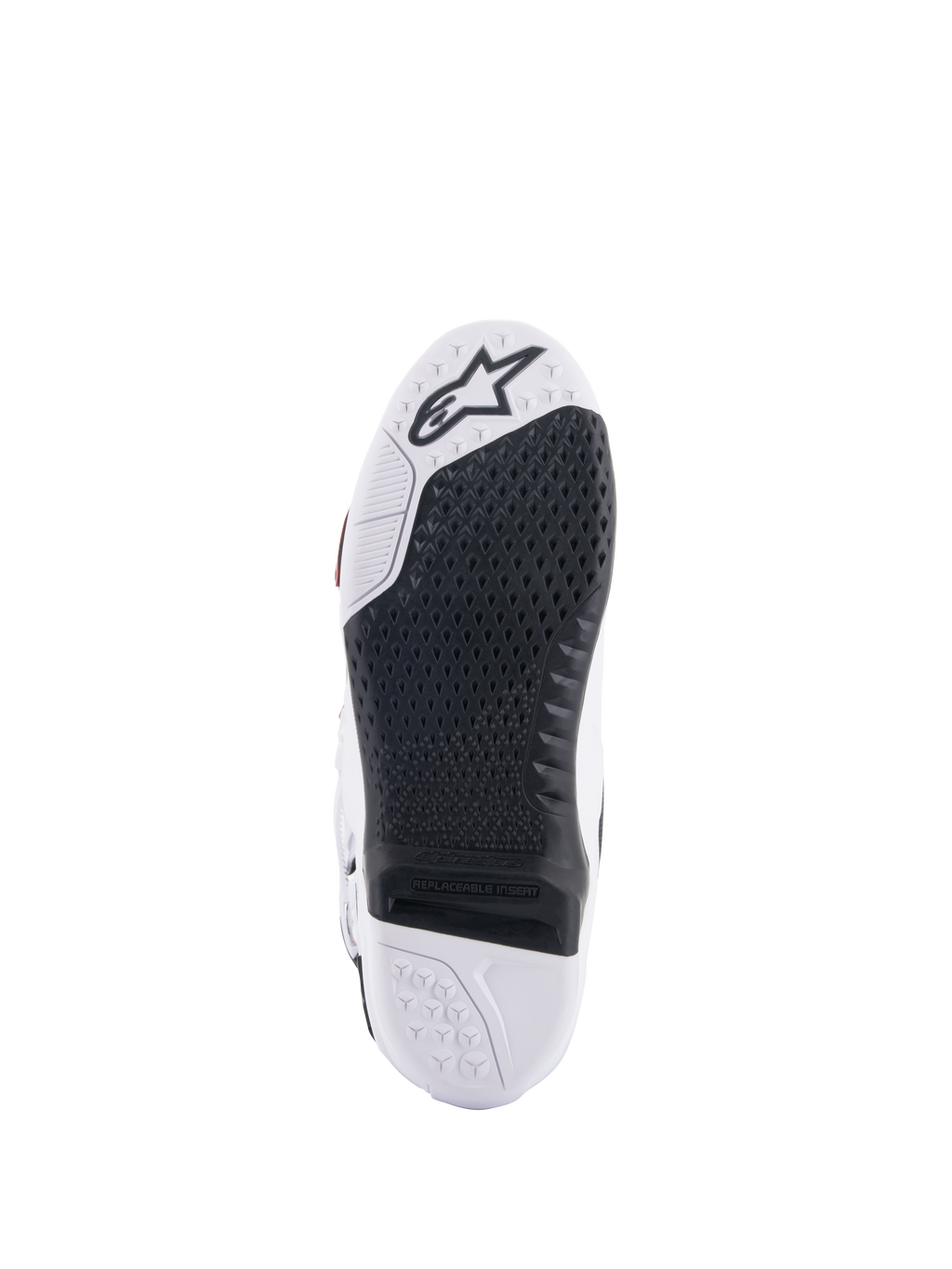 Botas Alpinestars Tech 10 Supervented, vista da sola branca e preta, design de aderência em favo de mel estendido, inserção central preta substituível, biqueira branca com logótipo de estrela Alpinestars, otimizada para controlo nos apoios de pés de motocross