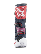 Botas Alpinestars Tech 10 Supervented, botas de motocross, Night Navy White Rainbow, vista frontal com placa de canela vermelha e logótipo branco, biqueira ventilada branca e construção em microfibra perfurada em azul marinho para máxima ventilação.