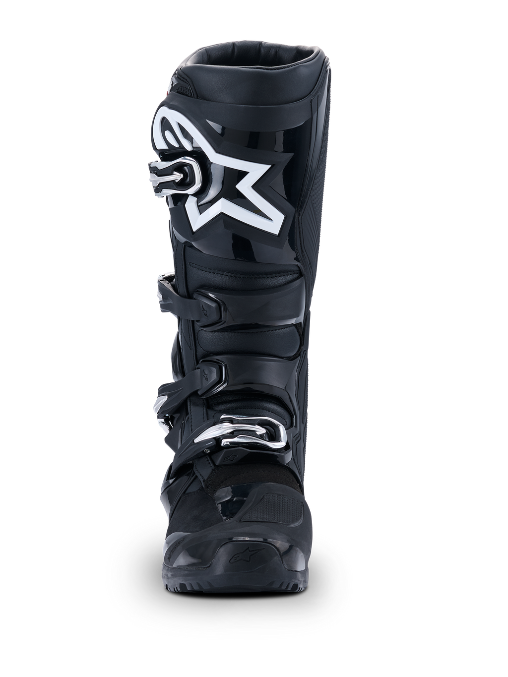 Botas Alpinestars 2026 Tech 7 Enduro Drystar®, botas de motocross pretas, vista frontal, com um sistema de fecho durável de quatro fivelas e logótipo de estrela branco proeminente na zona da canela, concebidas para performance em todo-o-terreno e enduro