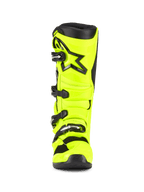 Botas Alpinestars Tech 7, botas de motocross, Amarelo Fluo e Preto, vista frontal, com concha de TPU em amarelo fluorescente brilhante, logótipo da estrela Alpinestars preto na canela e sistema de fecho com fivelas ajustáveis para desempenho off-road