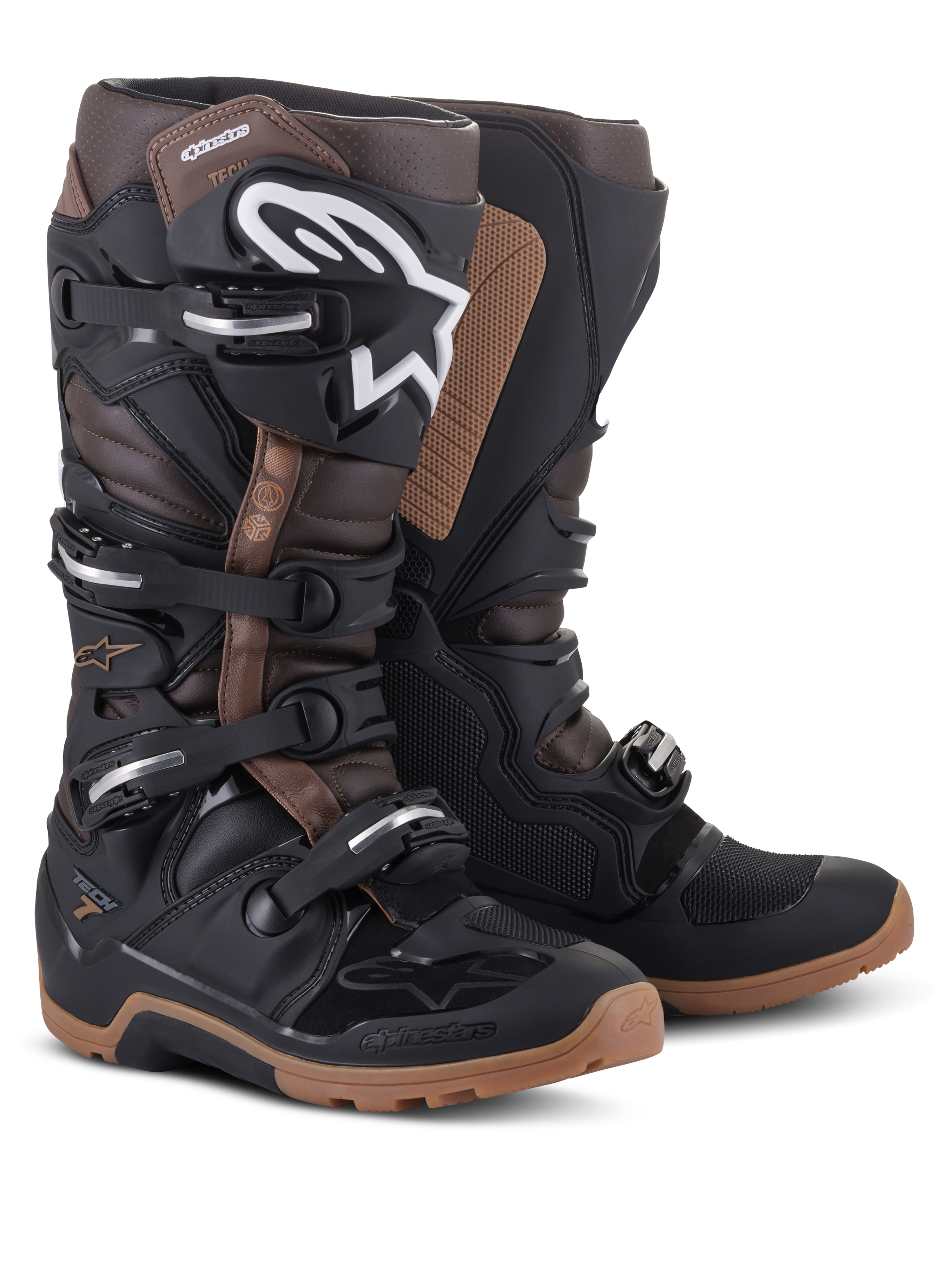 Botas Alpinestars Tech 7 Enduro, pretas e castanho escuro, botas de motociclismo todo-o-terreno com logótipo Alpinestars branco na canela, sistema de fecho de quatro fivelas e solas beges robustas