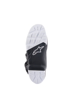 Alpinestars Tech 7 Enduro Drystar® Boots, sole detail view, high-grip black and white double density rubber compound, featuring the Alpinestars logo and replaceable footpeg insert, designed for off-road and enduro traction.