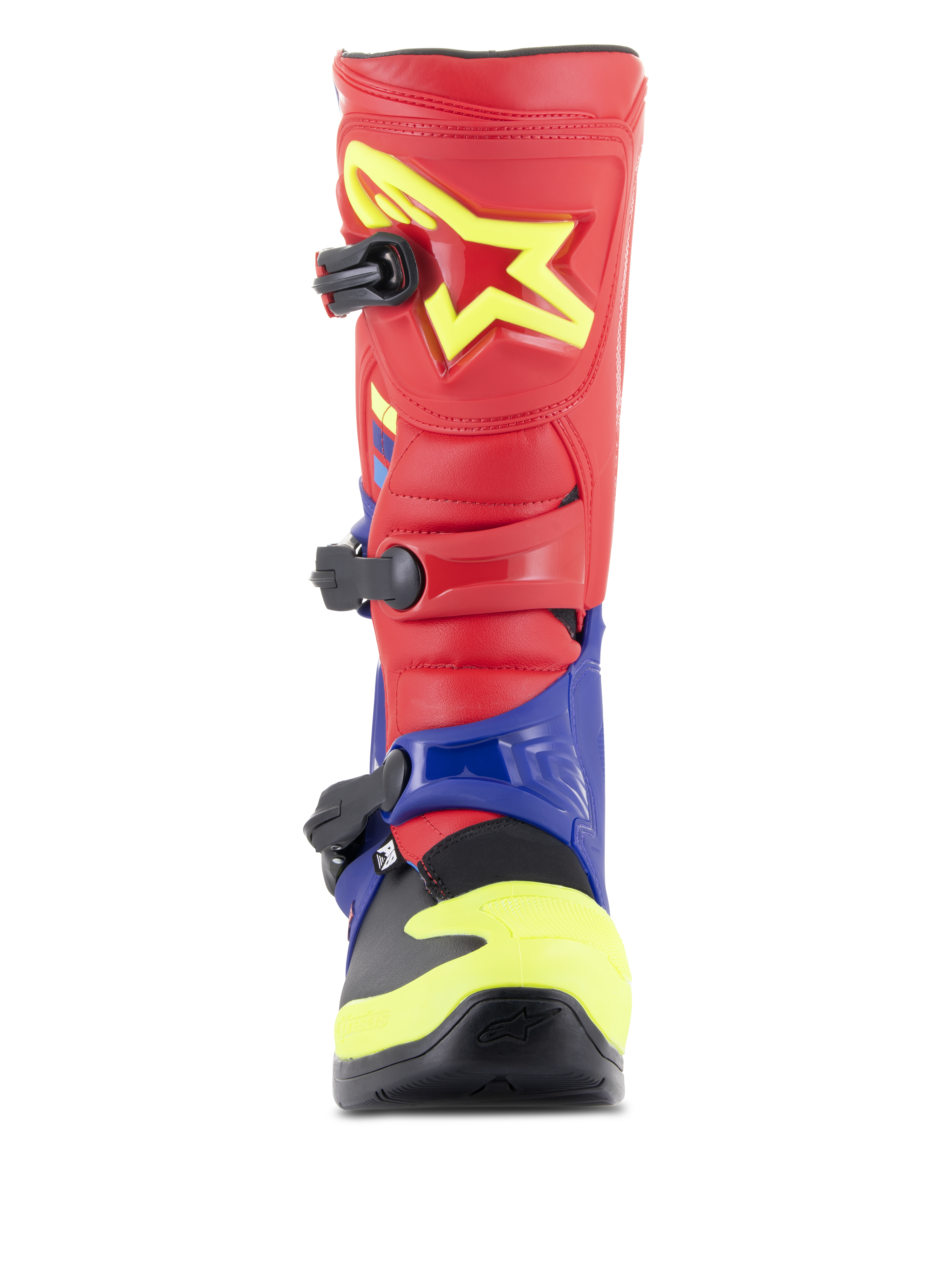 Botas Alpinestars Tech 3, botas de motocross, vermelho vivo, azul escuro e amarelo fluo, vista frontal mostrando o sistema de fecho de tripla fivela, placa de canela em TPU com logótipo de estrela amarelo e estrutura protetora do pé em composto duplo