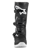 Botas Alpinestars Tech 3 Enduro Waterproof, botas de motocross e enduro, pretas e brancas, vista frontal com um grande logótipo de estrela branco na placa da tíbia em TPU, sistema de fecho de tripla fivela e sola branca rugosa para tração todo-o-terreno