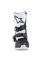 Alpinestars Kids Tech 3S Boots, Youth Motocross Boots, White Black and Enamel Blue, front profile showing TPU shin plate with star logo, black and white panels, and secure buckle closure system