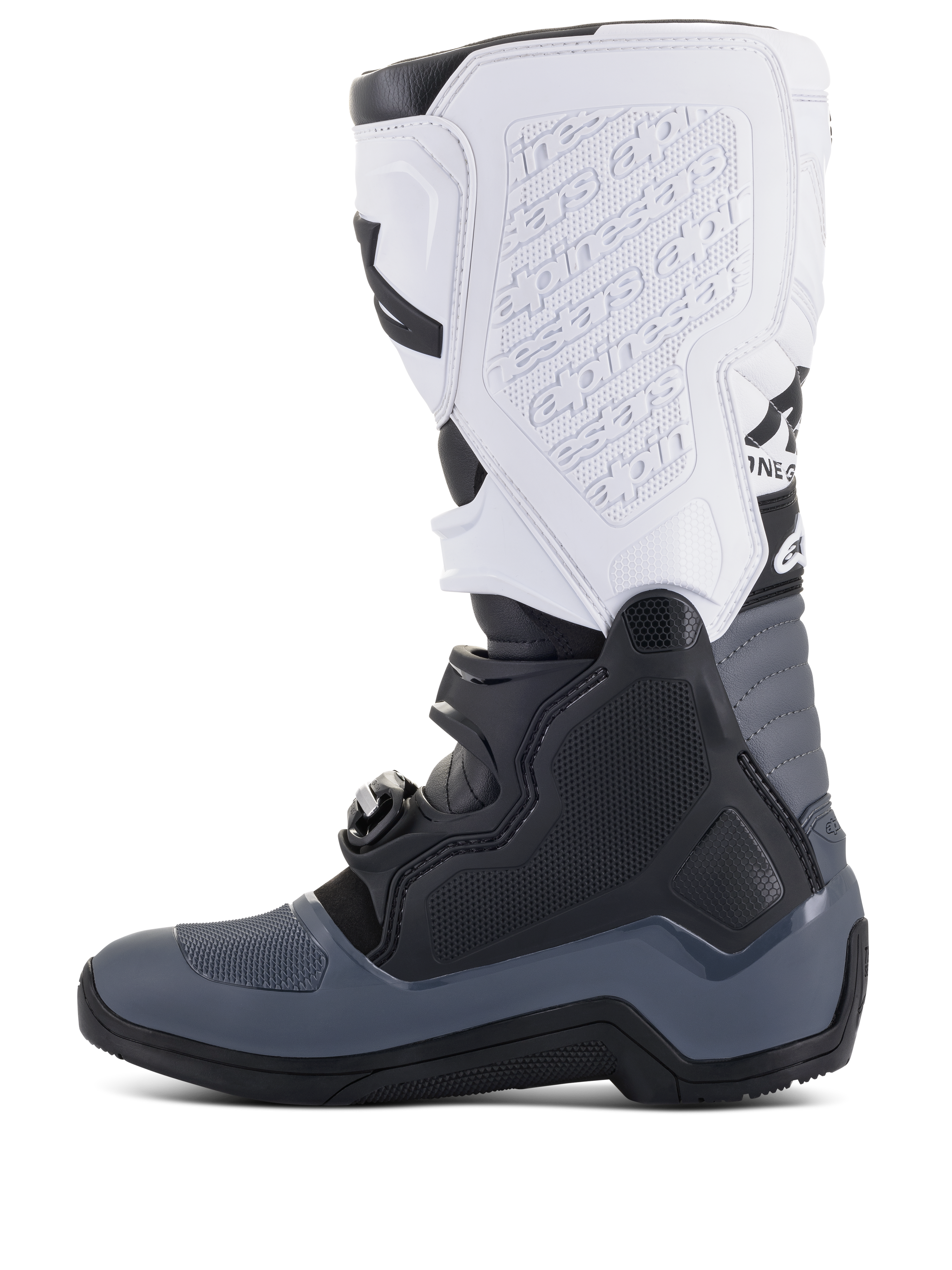 Botas Alpinestars Tech 5, botas de motocross, pretas, cinzento escuro e brancas, vista de perfil lateral com múltiplos fechos de fivela, marca em relevo na caneleira branca, construção durável para performance em todo-o-terreno