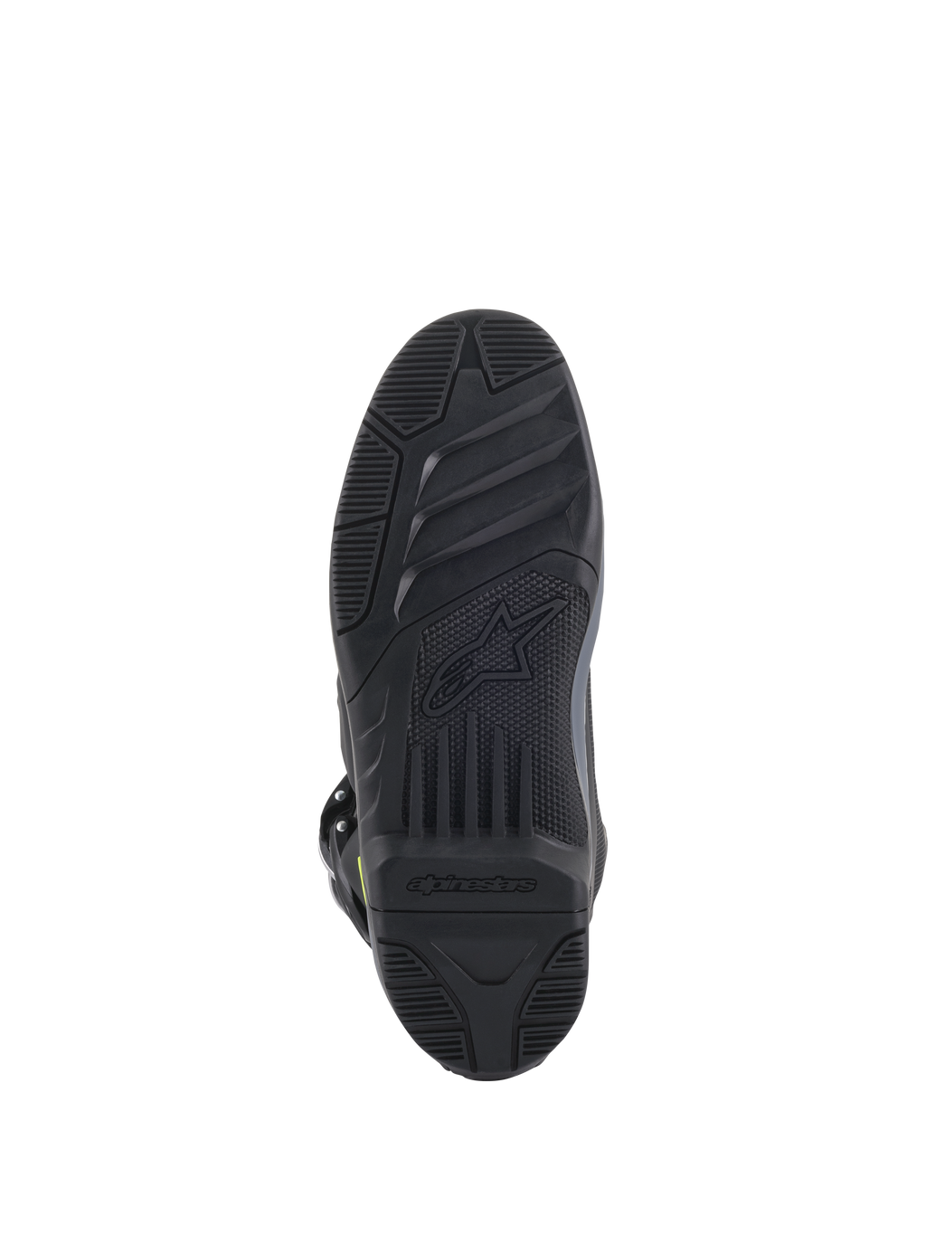 Botas Alpinestars Tech 5, vista da sola, pretas, padrão de rasto texturizado detalhado para aderência em todo-o-terreno, com o logótipo Alpinestars e o símbolo da estrela em relevo, construção durável de calçado de motocross