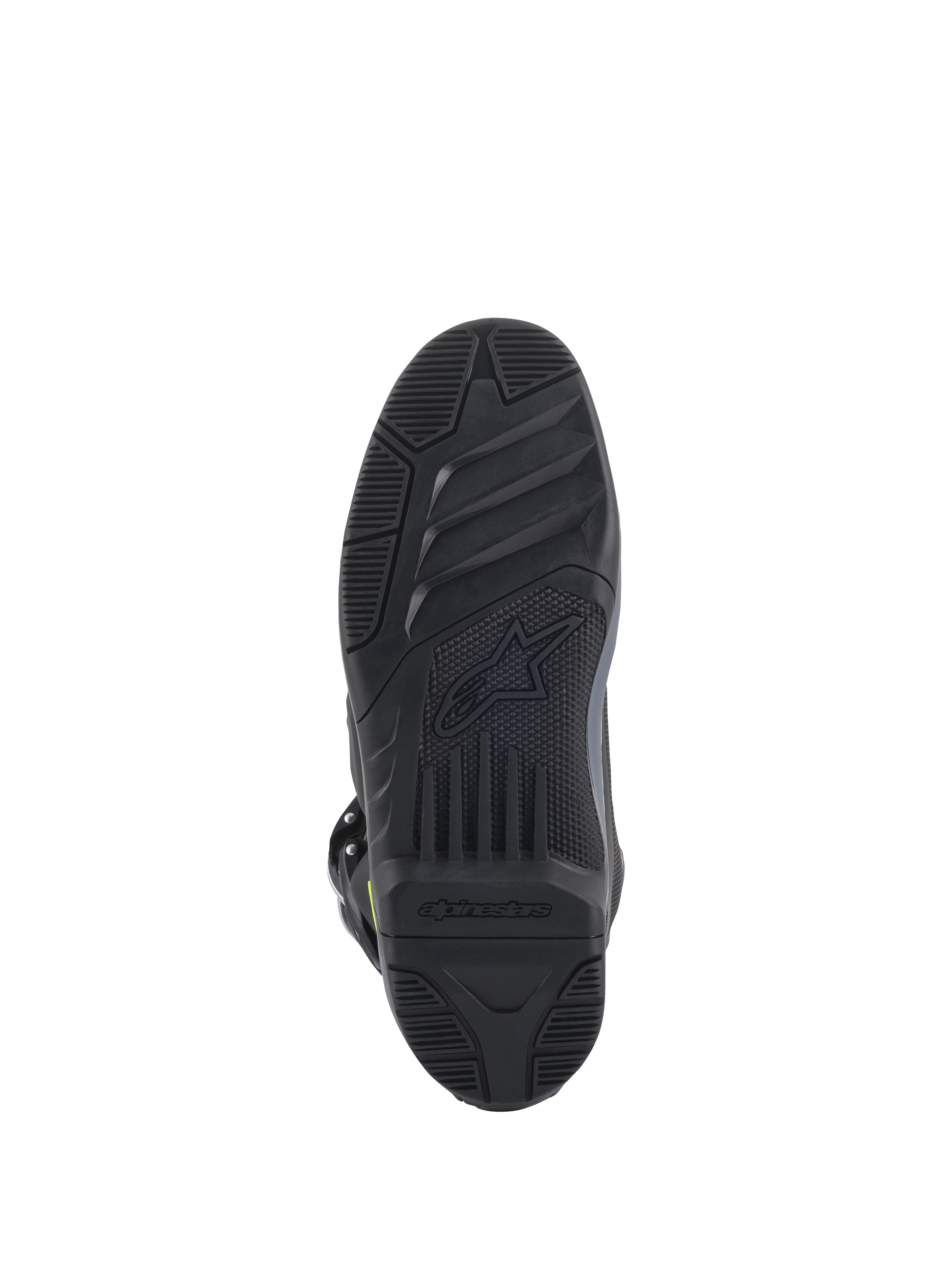 Botas Alpinestars Tech 5, vista da sola, pretas, padrão de rasto texturizado detalhado para aderência em todo-o-terreno, com o logótipo Alpinestars e o símbolo da estrela em relevo, construção durável de calçado de motocross