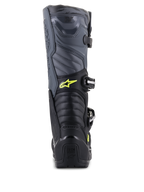 Botas Alpinestars Tech 5, botas de motocross, pretas, cinzento cool e amarelo fluo, vista traseira mostrando zonas de flexão em acordeão e proteção de calcanhar, com logótipo Astars amarelo e marca Tech Series em relevo, construção durável multimaterial para desempenho todo-o-terreno