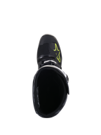 Botas Alpinestars Tech 5, vista superior, pretas com logótipo Amarelo Fluo na biqueira, mostrando o forro interior e o fecho de fivela, calçado de alta performance para motocross e todo-o-terreno